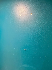 Bathroom wall with holes