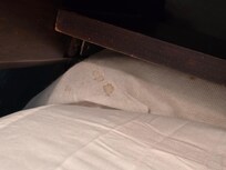 Old stained boxspring cover