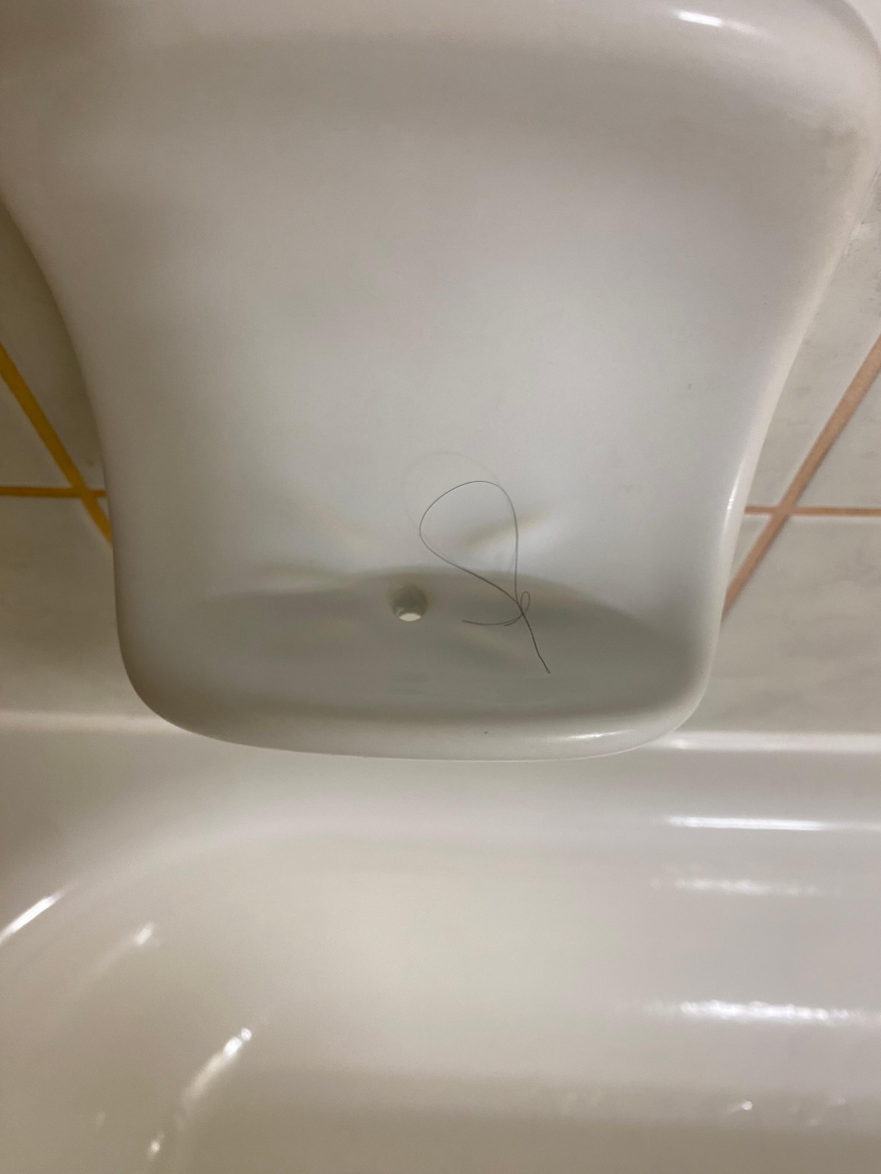 Hair in tub