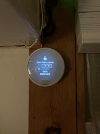 The thermostats are next to the units and locked. You have to sit beneath them if you want to be comfortable in the drafty house. You must call (not text) to change the temperature.