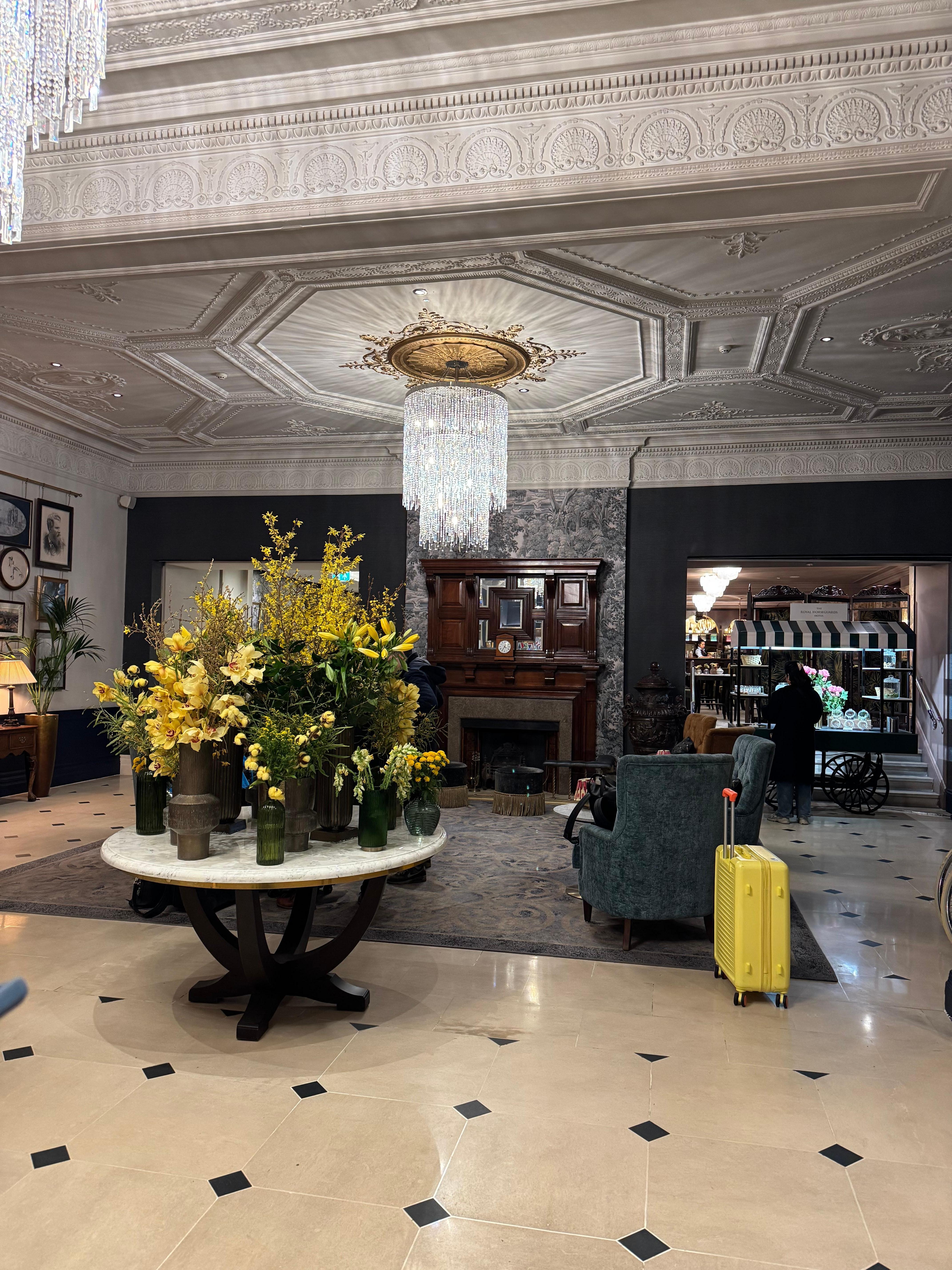 Inviting reception area with fresh cut flowers, flavored water, bellmen, doorman and borrowed umbrellas! 