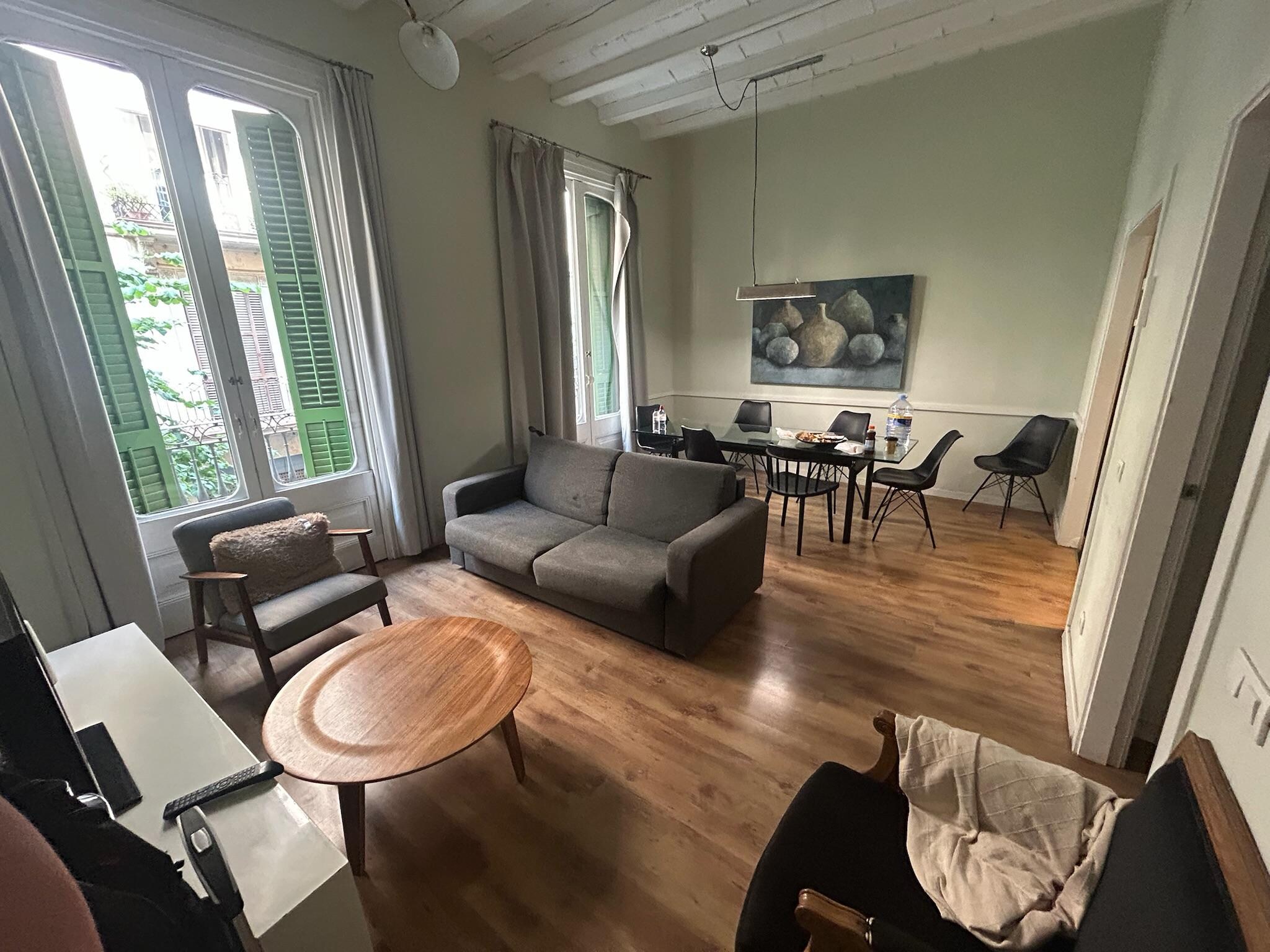 Curtains are coming off on right window. 