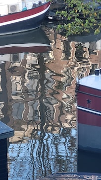 Reflections in Singel Canal from the apartment