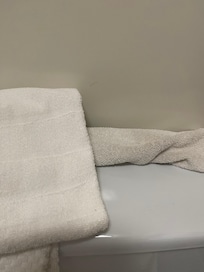 Wash clothe darkly stained. Towel to show color difference