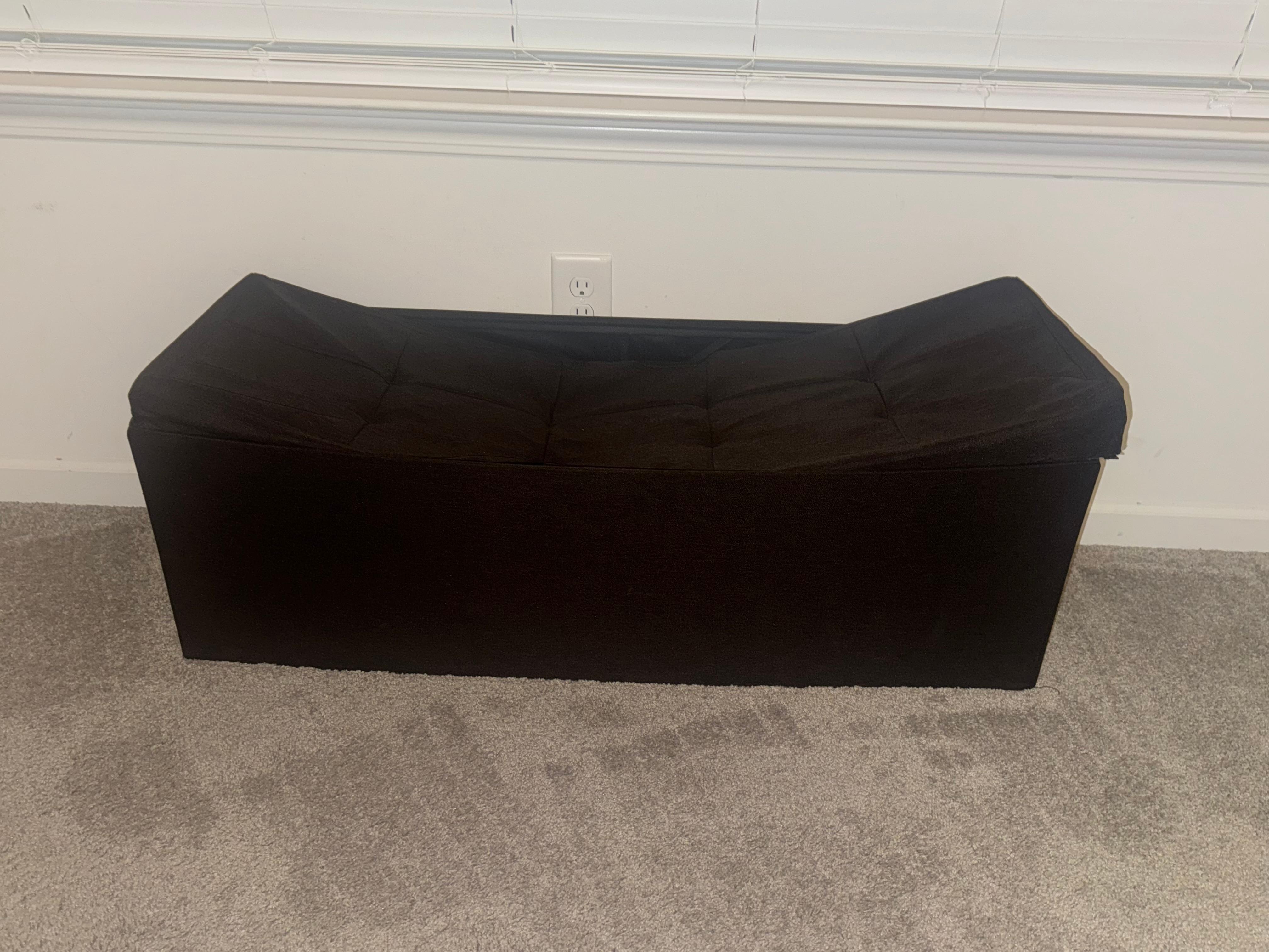 Broken ottoman in master