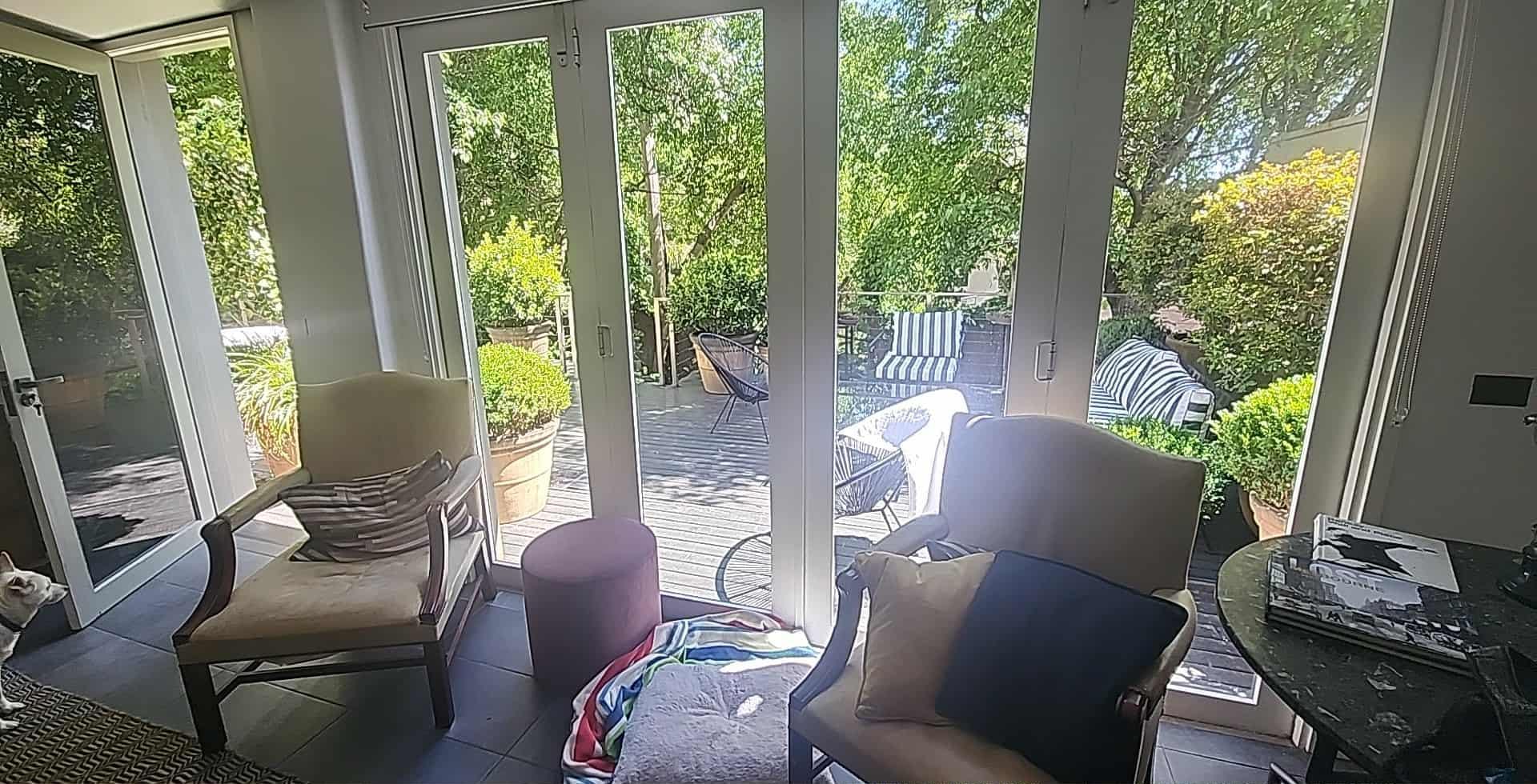 Looking out through the bifold doors into back garden/courtyard.