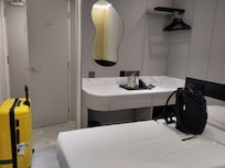 Small table, mirror and some storage space (with mini fridge)