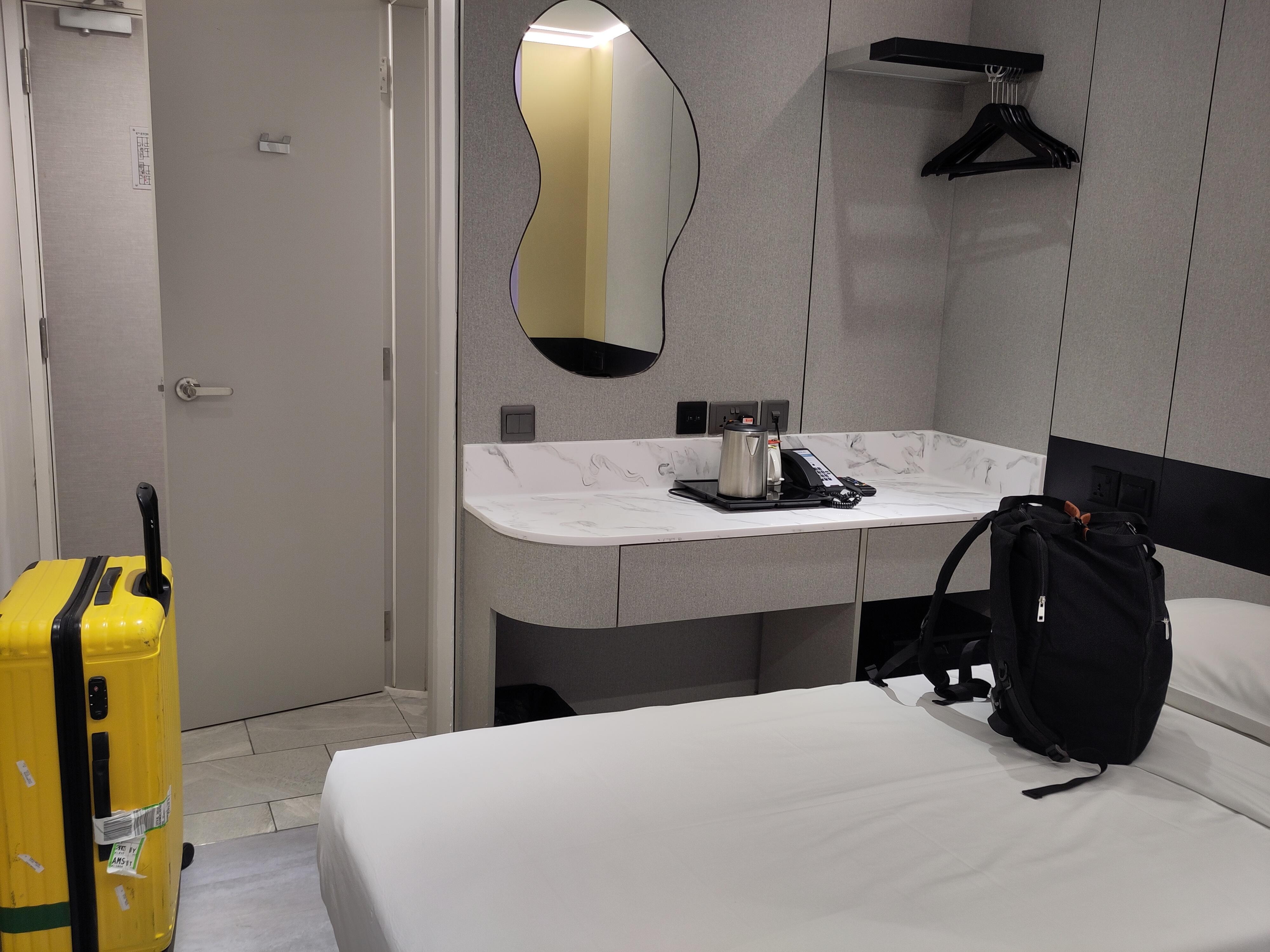 Small table, mirror and some storage space (with mini fridge)