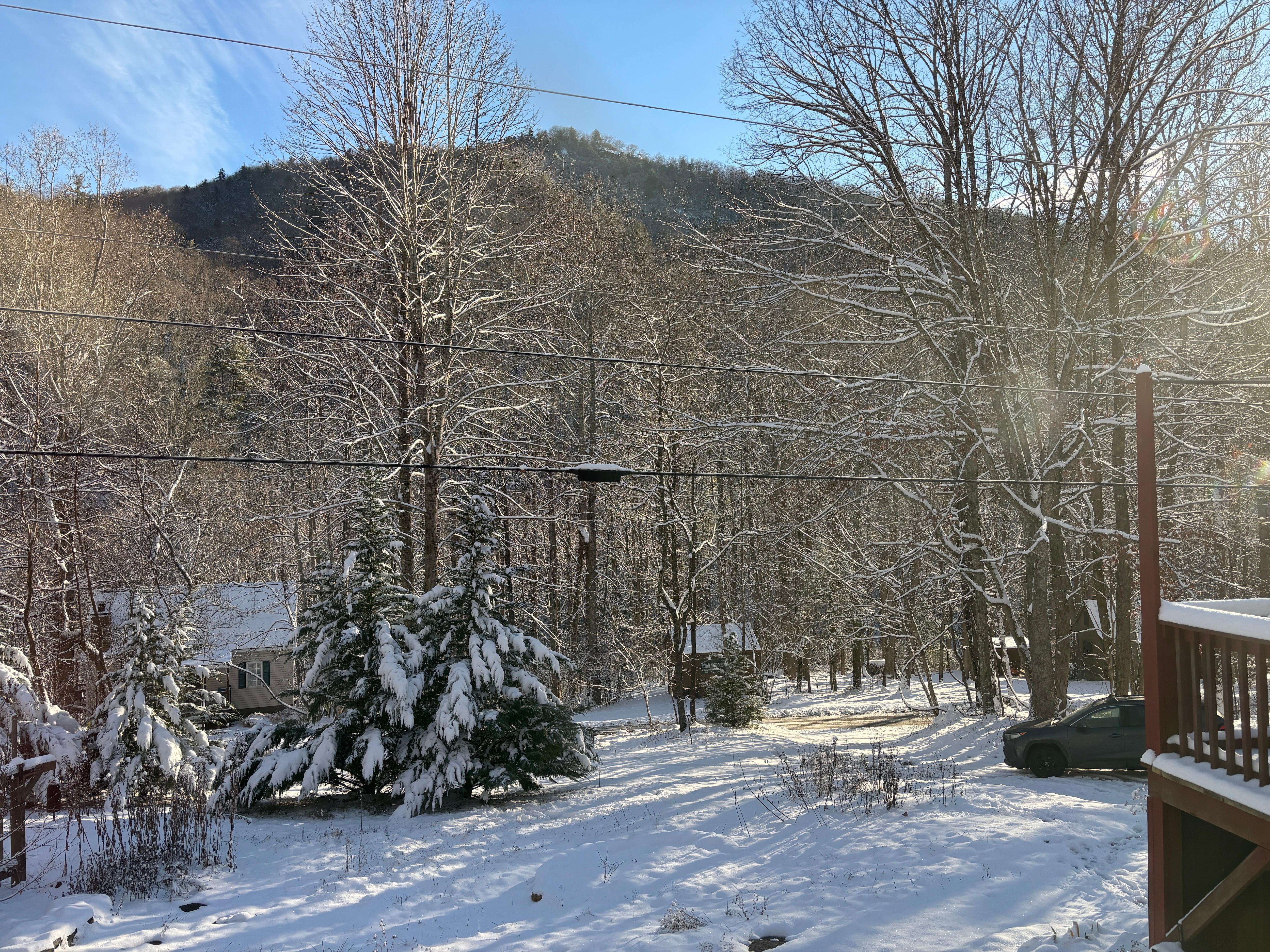 A view from the back of the property, seeing the mountain peak from across the way.