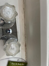 The whiskers behind this faucet were not mine, they were present when I checked in.