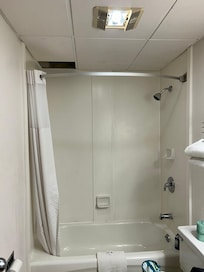 Hole in ceiling above the shower