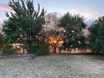 Vue de la terrasse au couché du soleil