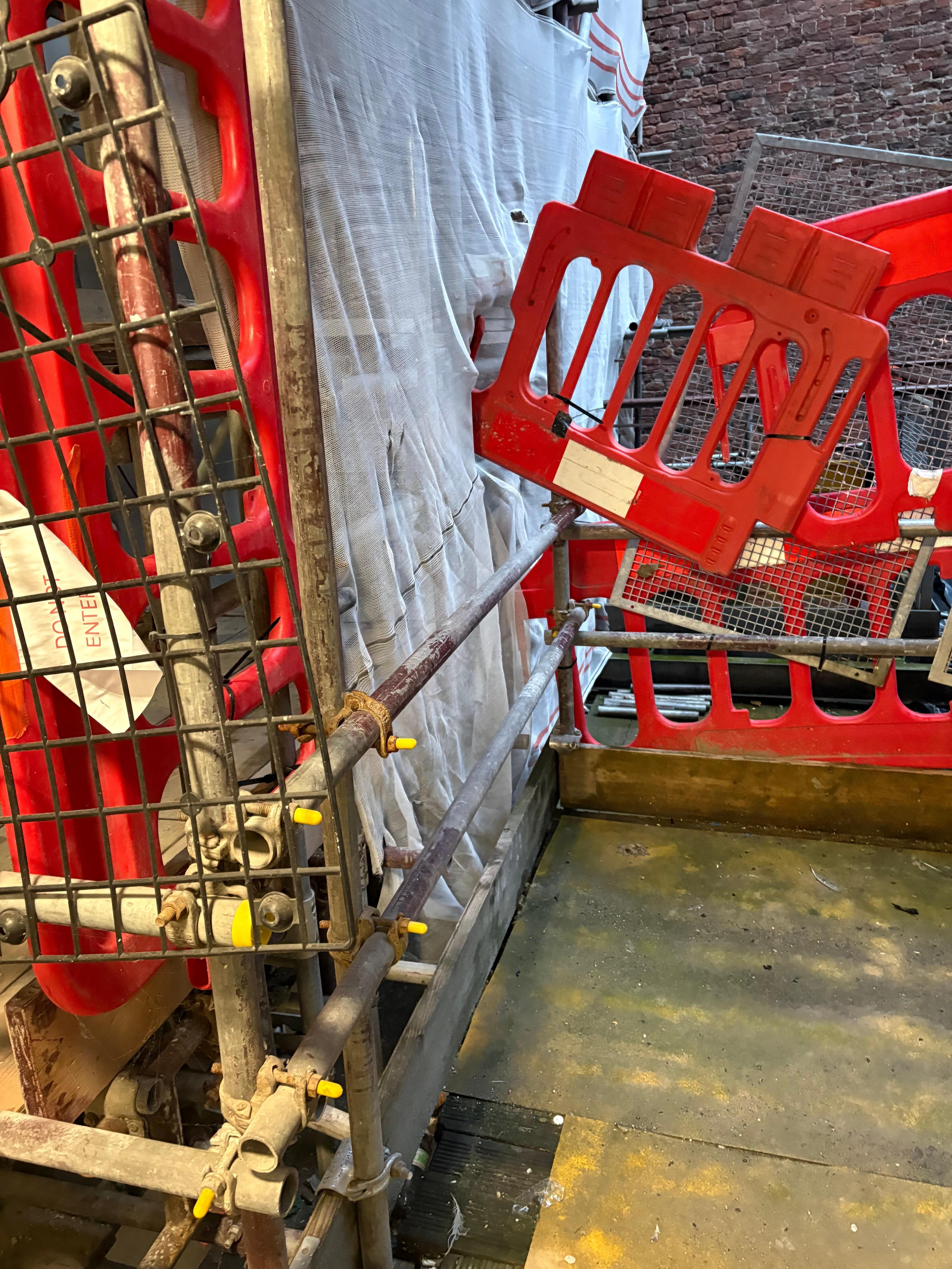 Scaffolding all around the property. Not warned. 