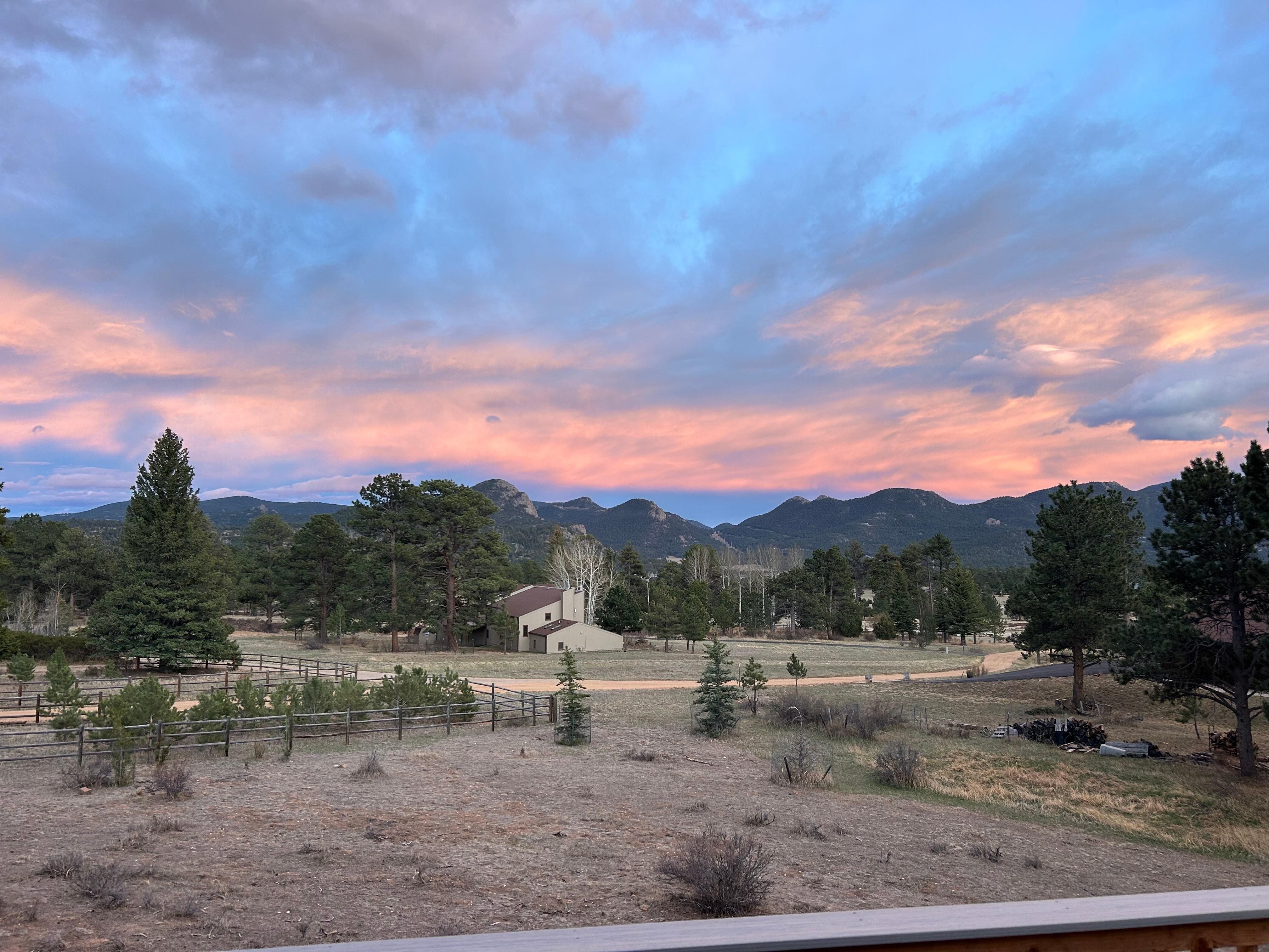 SE sunset view from the dining room deck.