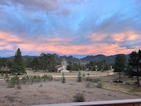 SE sunset view from the dining room deck.