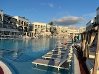 All those pool loungers are cabana reservation only. They will move you out of them unless you paid for cabana