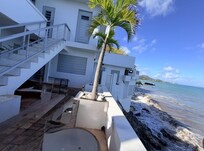 Main outdoor level looking at doors to suites