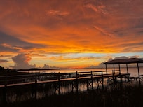 View of the lake at sunset from the porch.