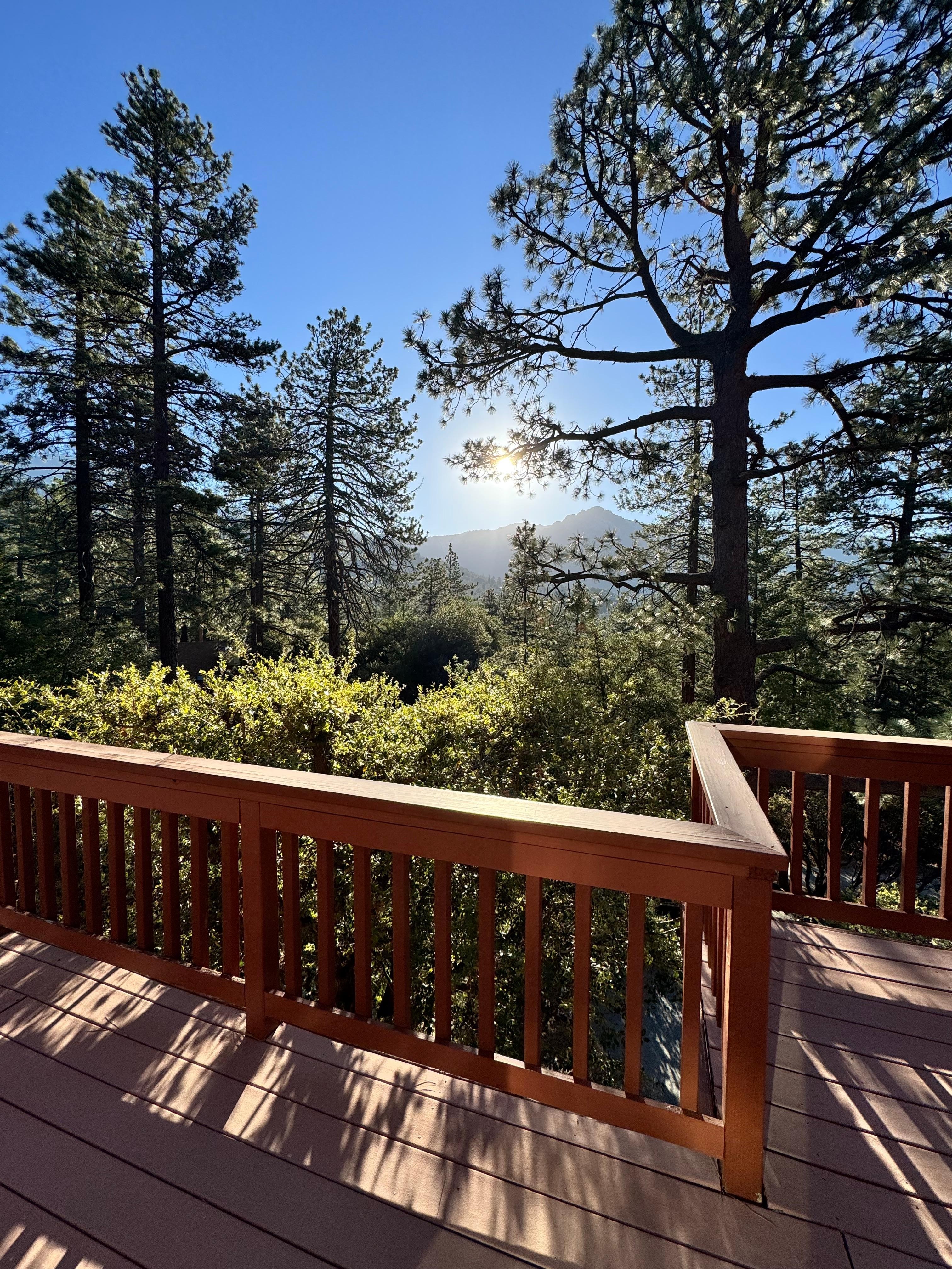 Deck on front of house with view 
