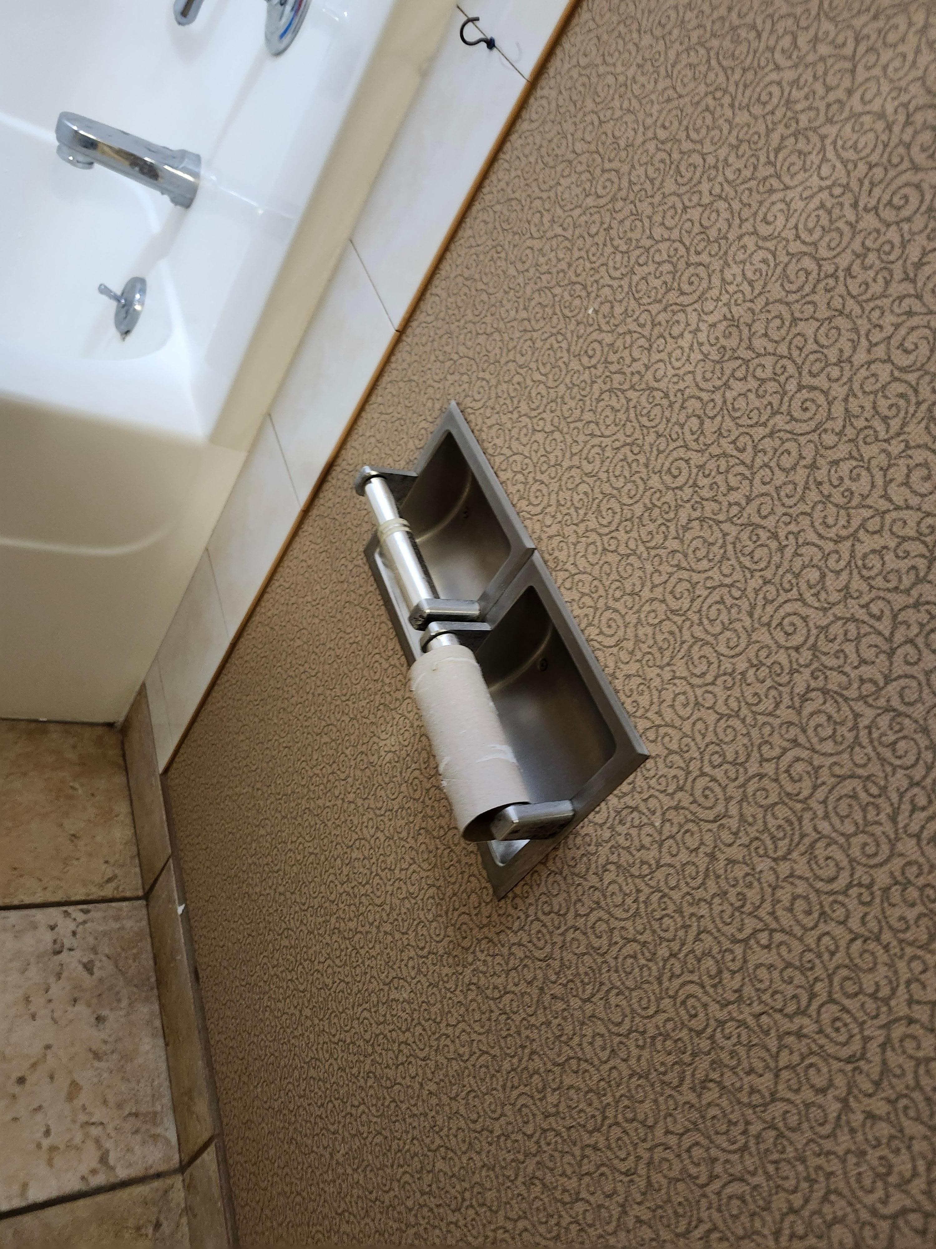 So, the half roll of toilet paper should have been put on at least? 