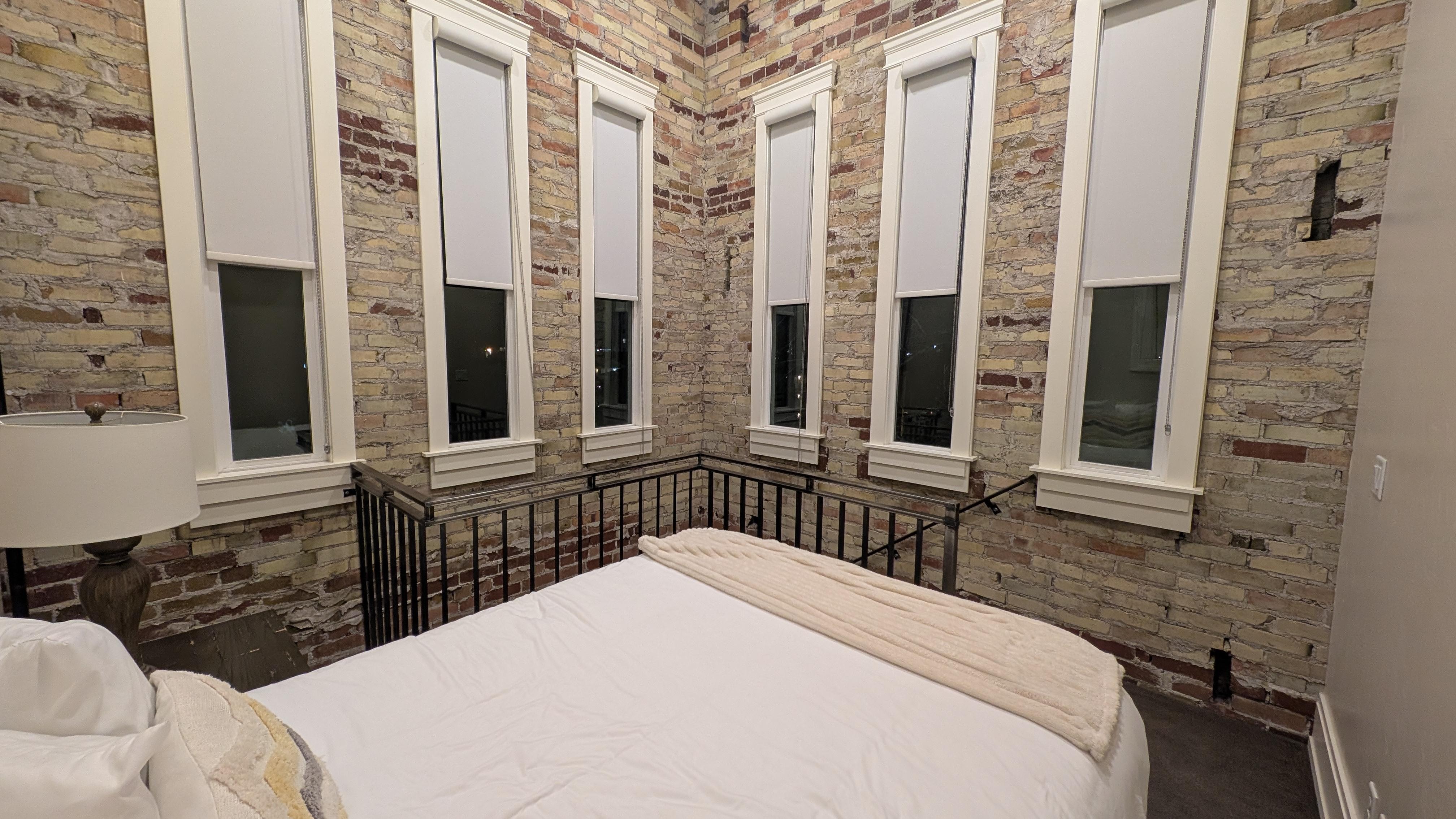 The cozy bell tower bedroom - its small, but comfortable with openable windows, the adjustable shades.