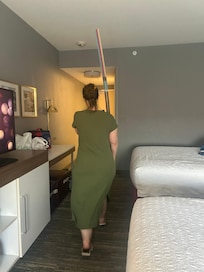 The manager removing the panel and if you look above her you will see the electrical tape.