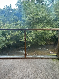 Side porch with view of creek