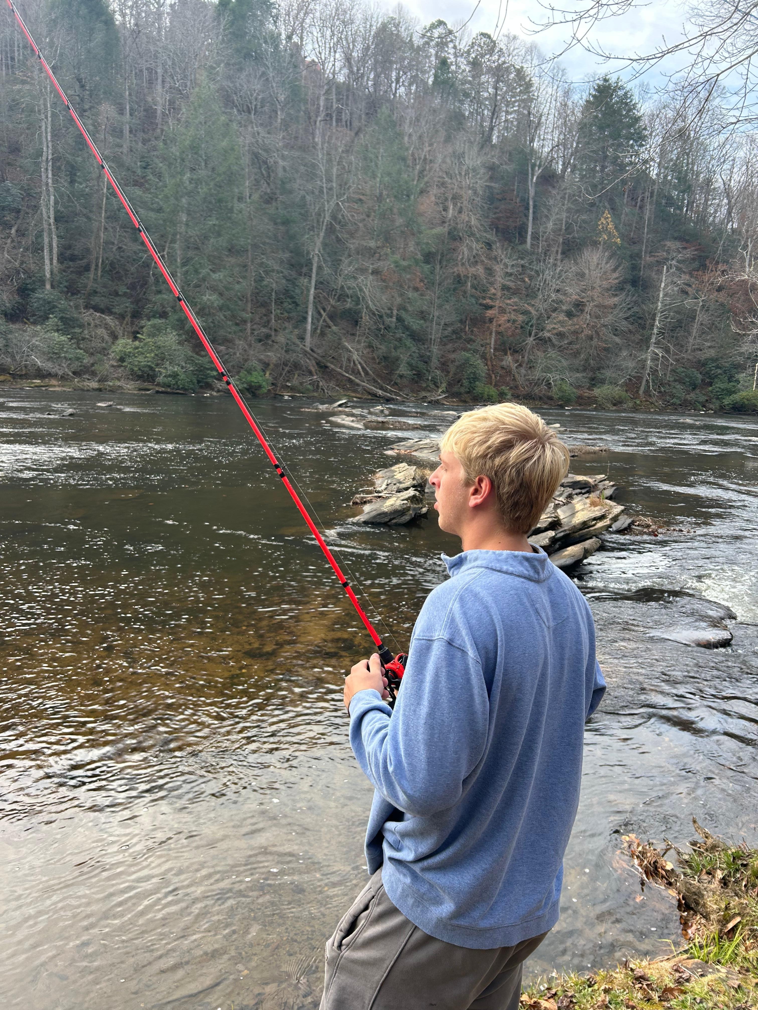 Fishing behind the house.