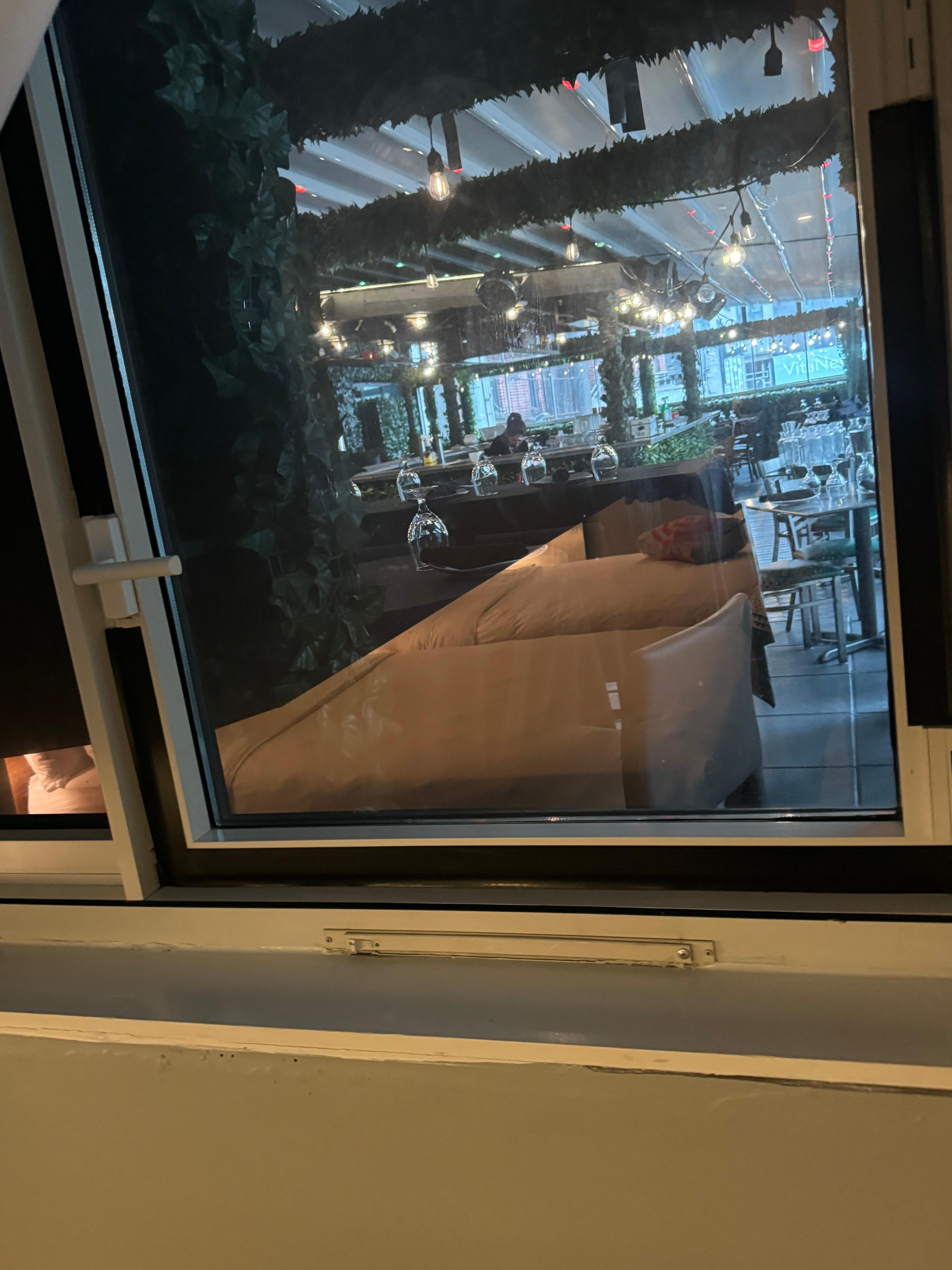 Bedroom window SHARED WITH A RESturant. 