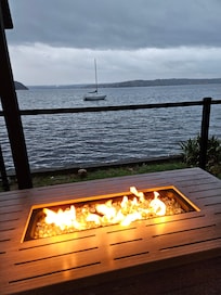 Wine by the fire table on the back deck