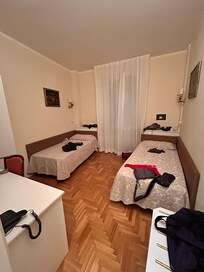 Simple room with 2 single beds, clean.