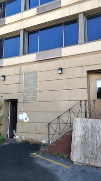 Left side front view of the hotel entrance was very dirty with paint missing. Stray cats were lounging and going in and out an open door to the hotel creating a  unhygienic and unwelcoming first visit.