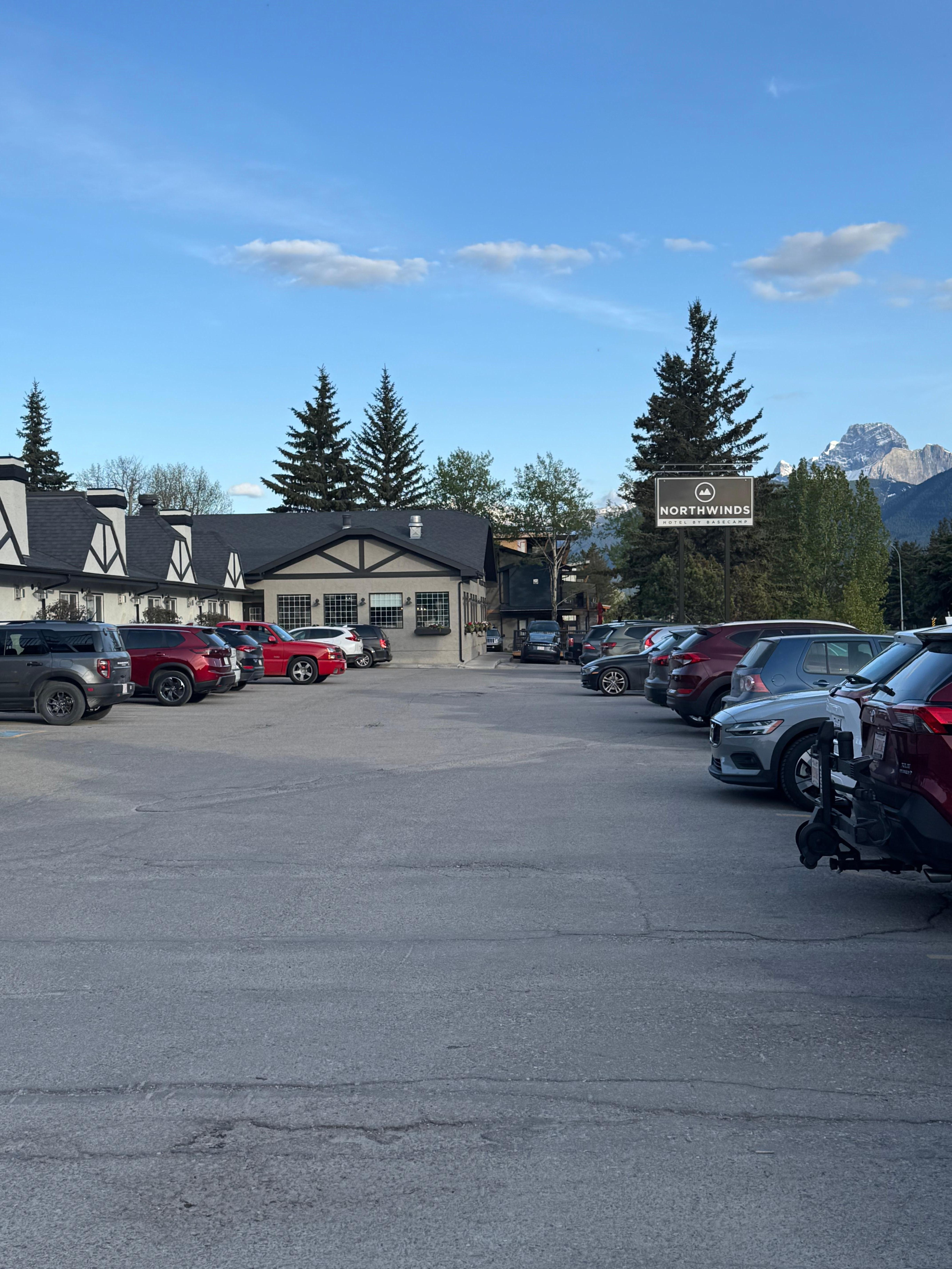 Parking and hotel sign