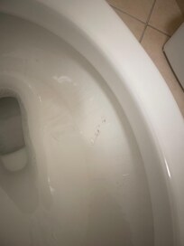 What we thought was a uncleaned toilet was indeed a scratch in the porcelain as stated by your night manager.