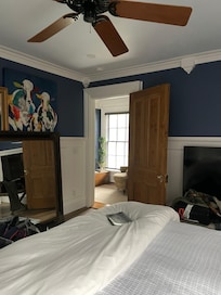 Looking from back of bedroom to bedroom door.