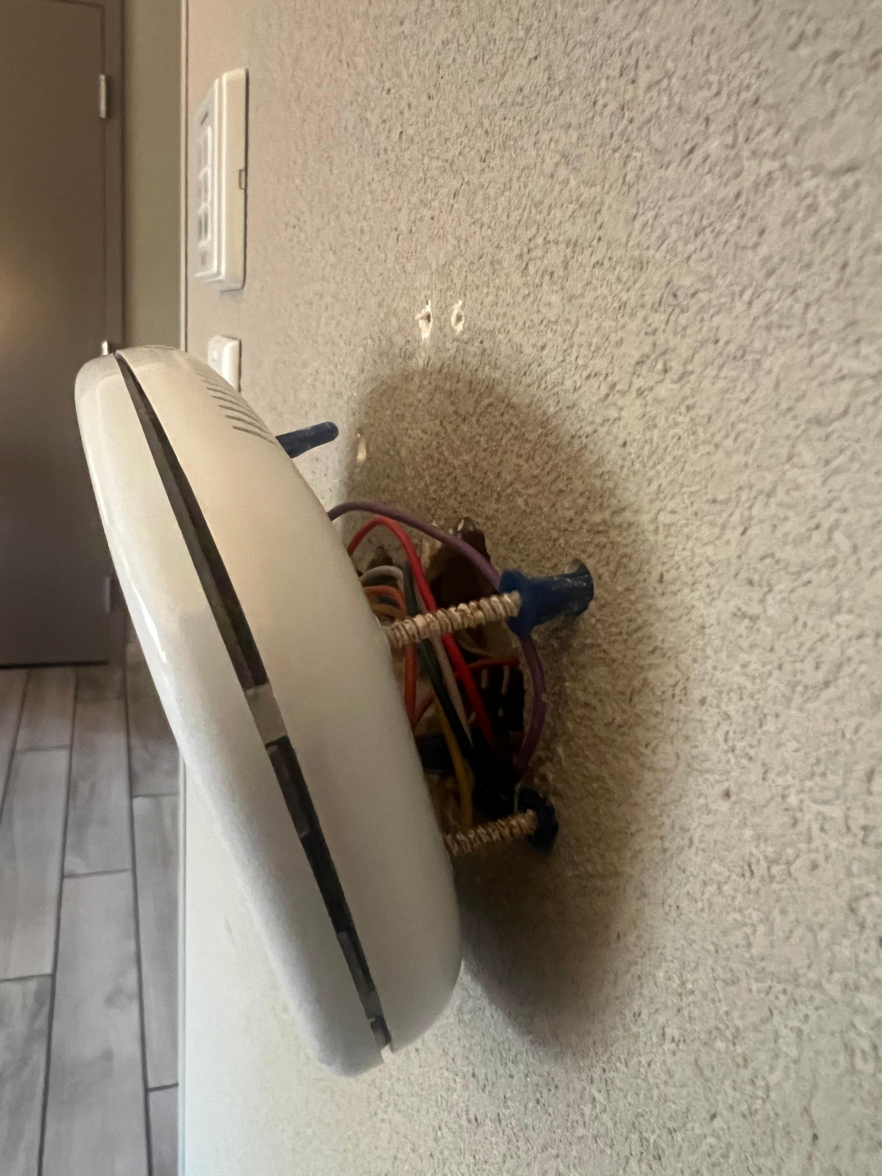 thermostat holding by wires 