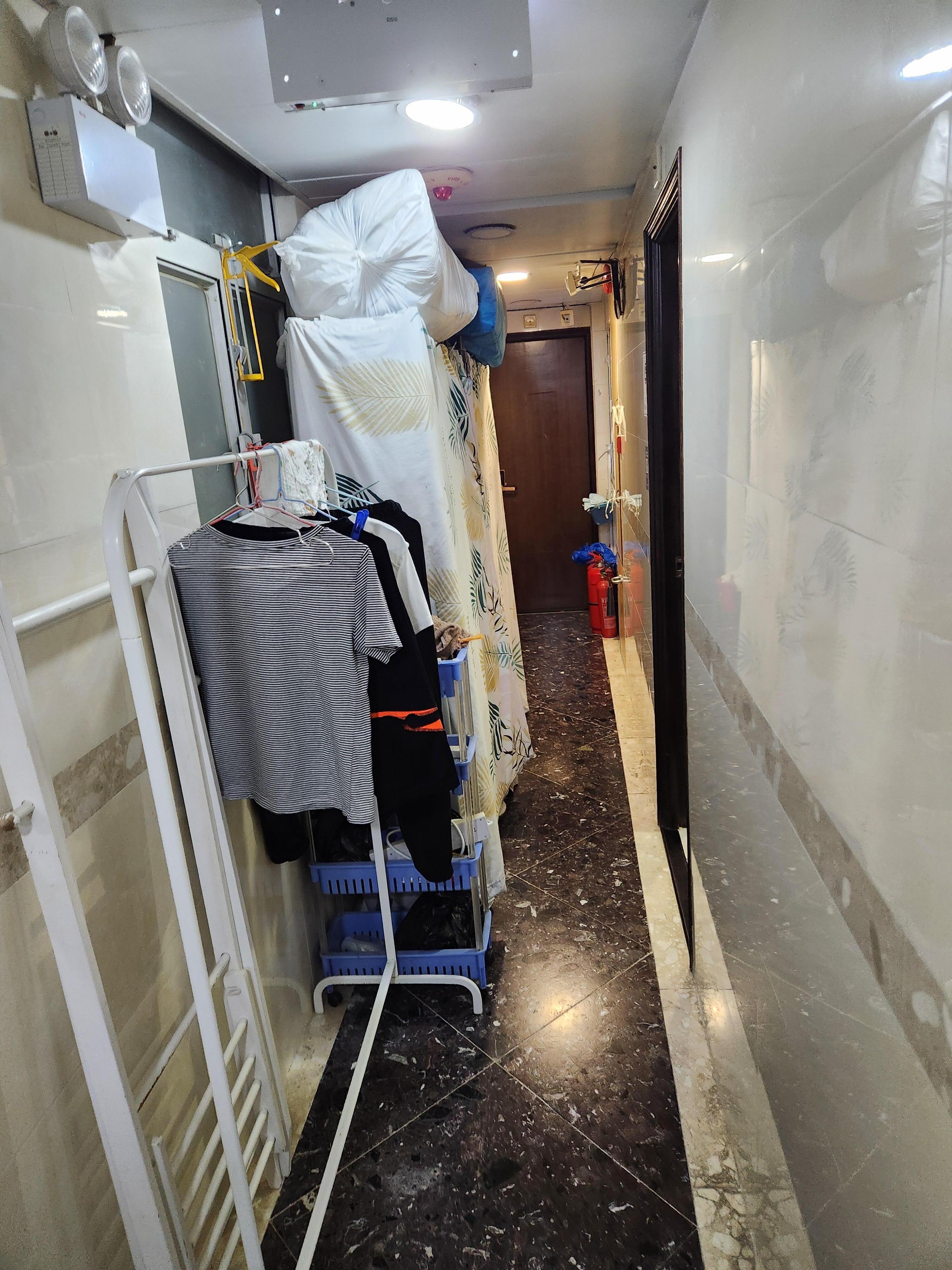 Cluttered stuff outside room and fire hazard