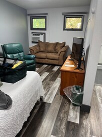 Recliner needs stoppers on bottom so it doesnât slide into wall. Dangerous!