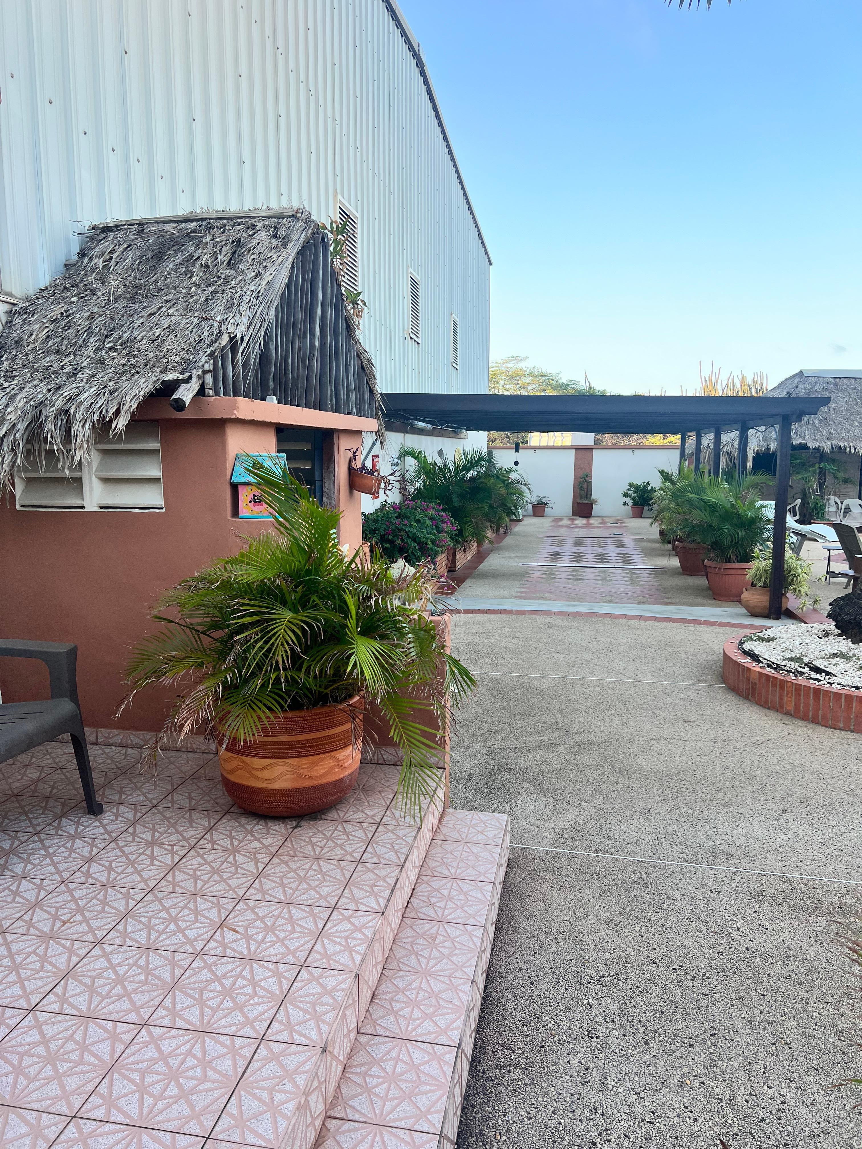 Outdoor shower to the left. 