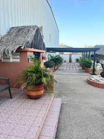 Outdoor shower to the left.