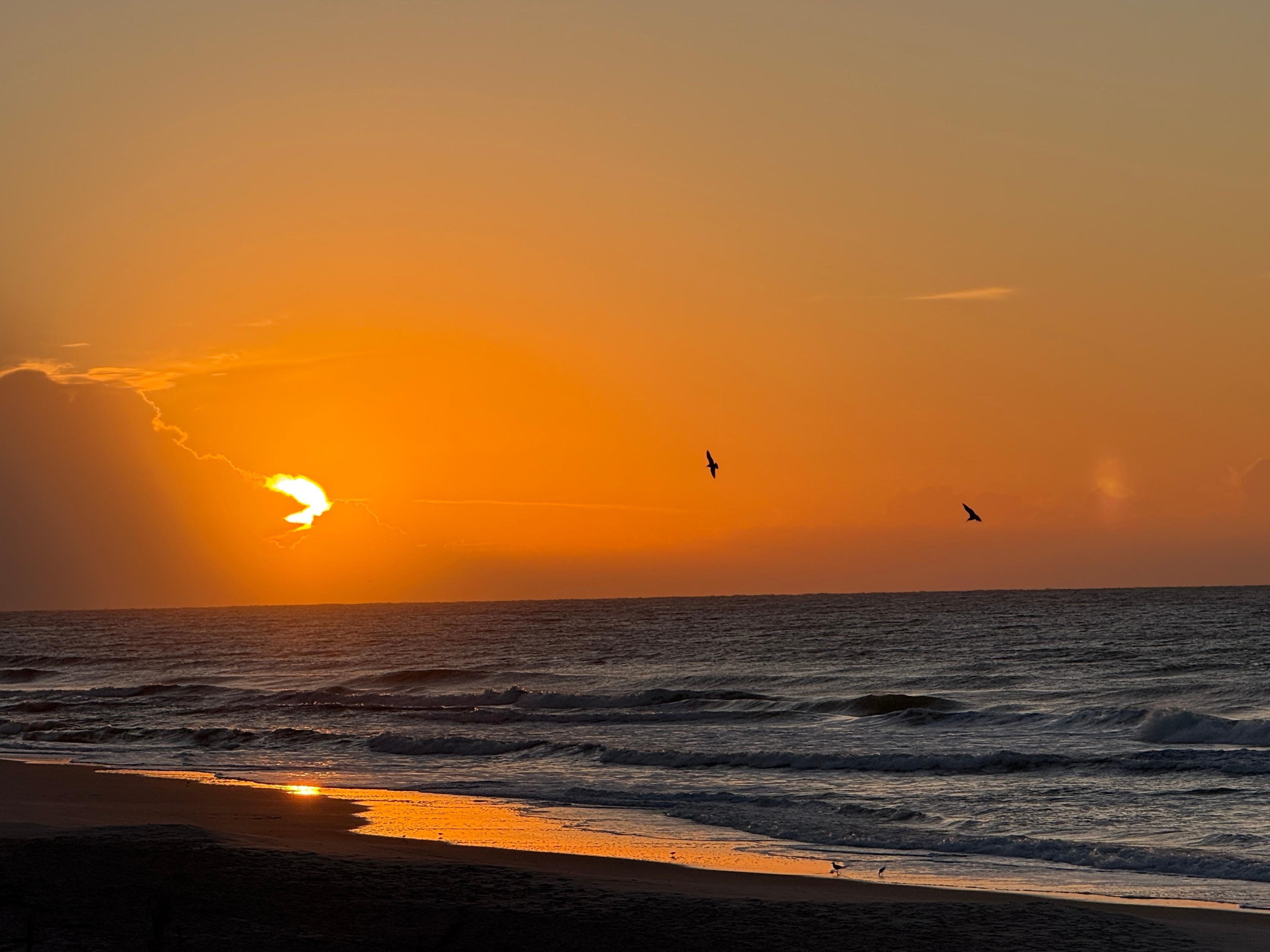 Sunrise from the beach right in front of the property!