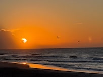 Sunrise from the beach right in front of the property!