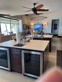 Kitchen with a view toward the living room seating.