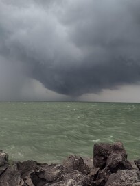 Watched storm on other side of lake in perfect weather.