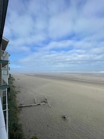 Beach view looking out the balcony and to the left