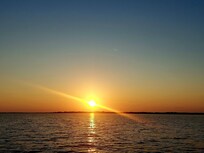 Sunset from nearby boating on the lake
