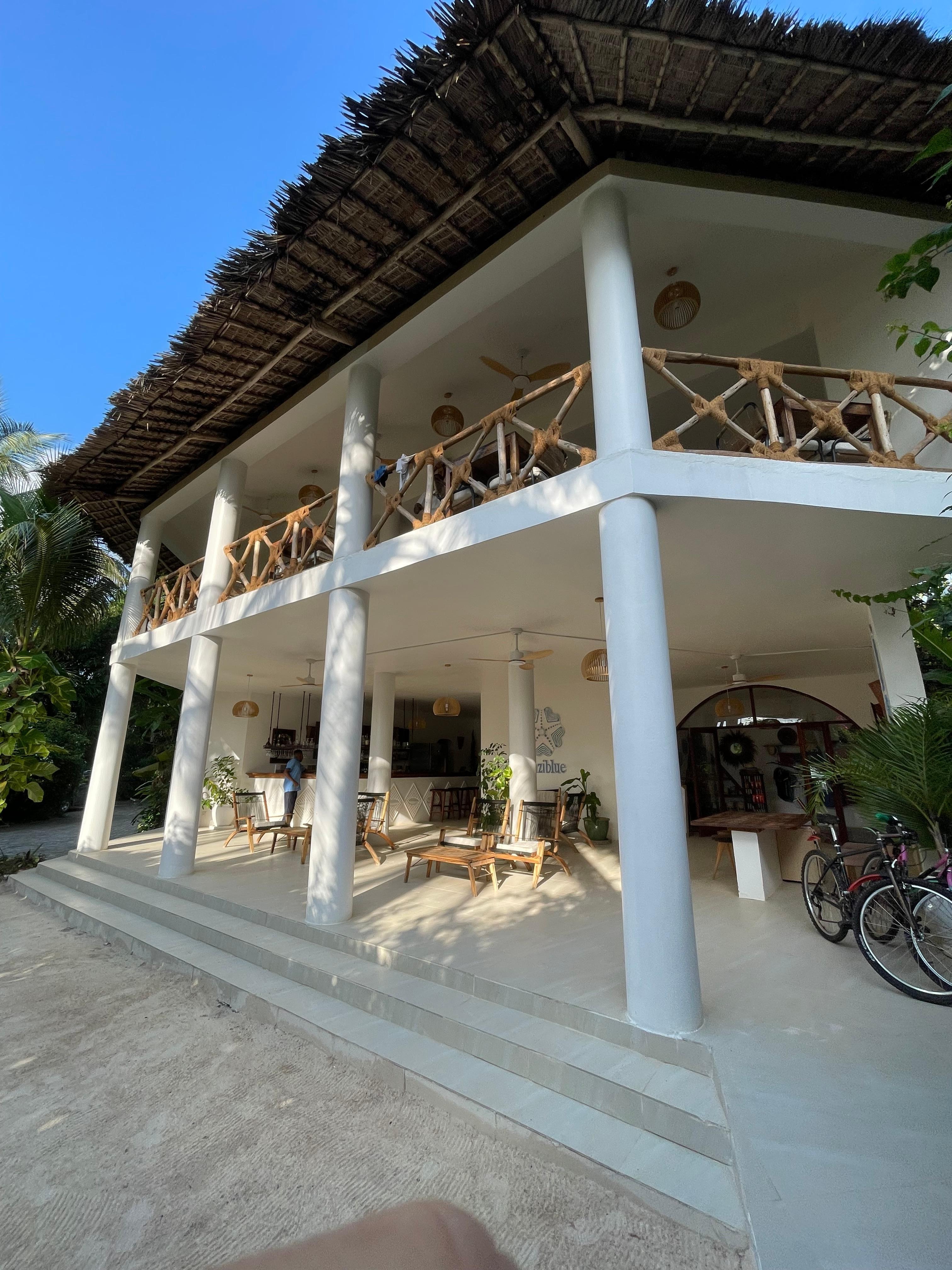 Main building with reception and restaurant on the second floor, also serving the breakfast. 