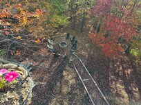 View of fire pit behind the house