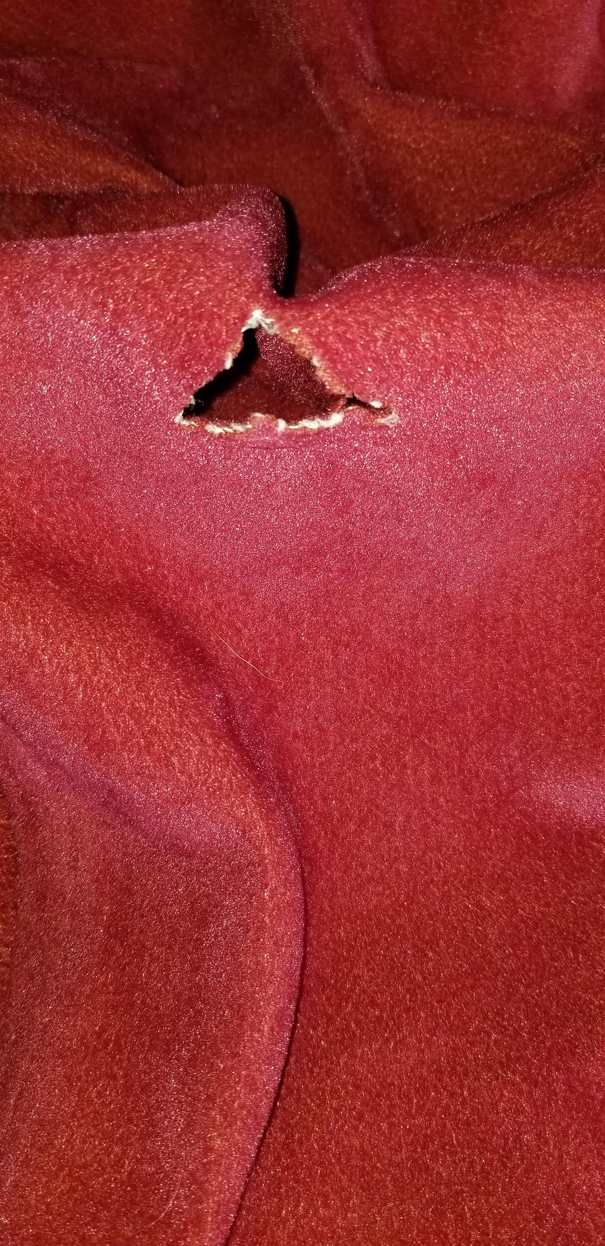 One of multiple holes in the blanket 