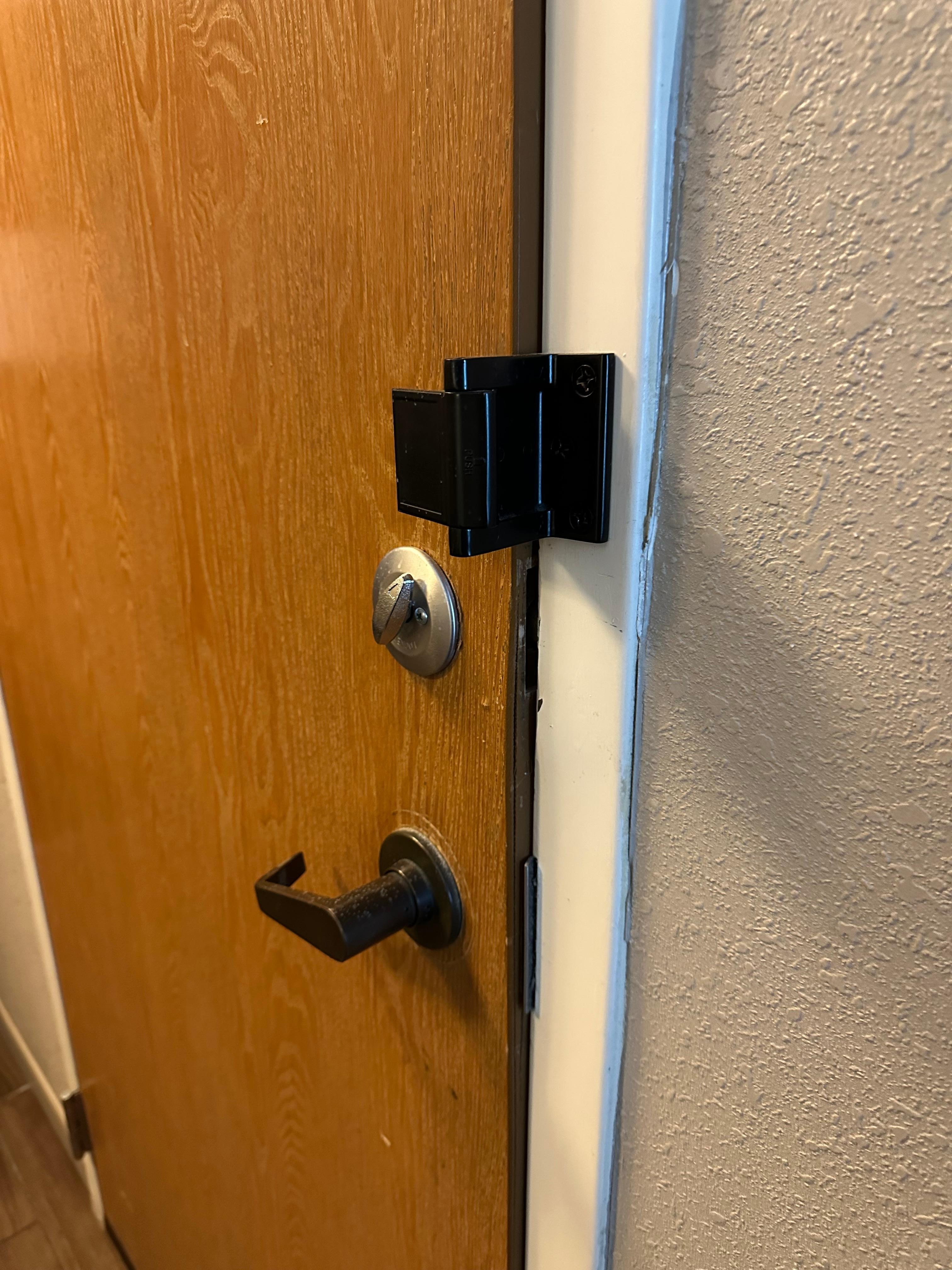 Connector door to the room next to mine that was definitely not able to be closed anymore than this.